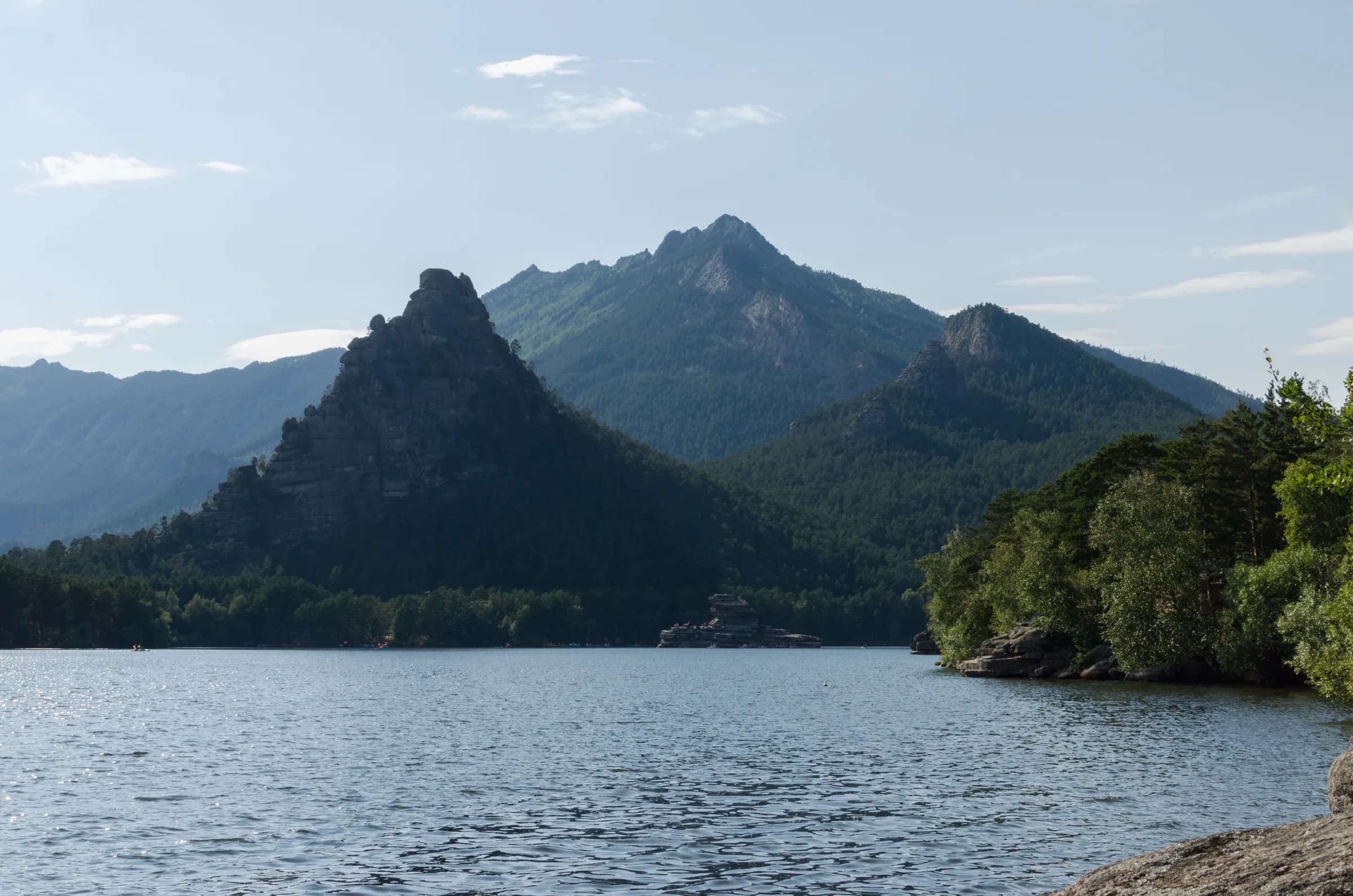 Turquoise lake and granite cliffs in Burabay National Park